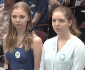 ​   Nora and Hope Henning testify in support of Spokane’s renewable energy ordinance.  ​